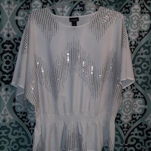 White sequin blouse